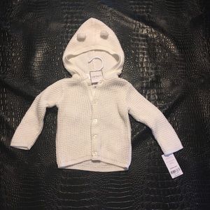 White baby button up sweater